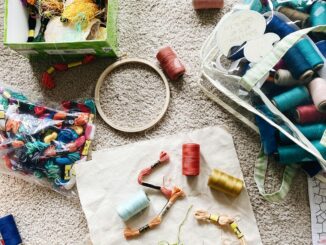 white and green plastic clothes hanger